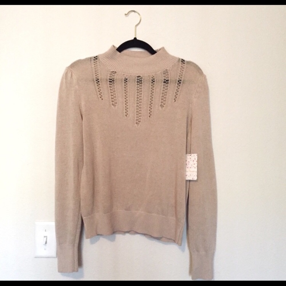 Free people sweater. Never worn!